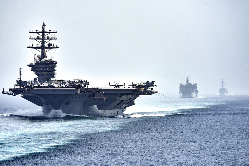 USS Dwight D. Eisenhower aircraft carrier and escort ships transiting the Strait of Hormuz
