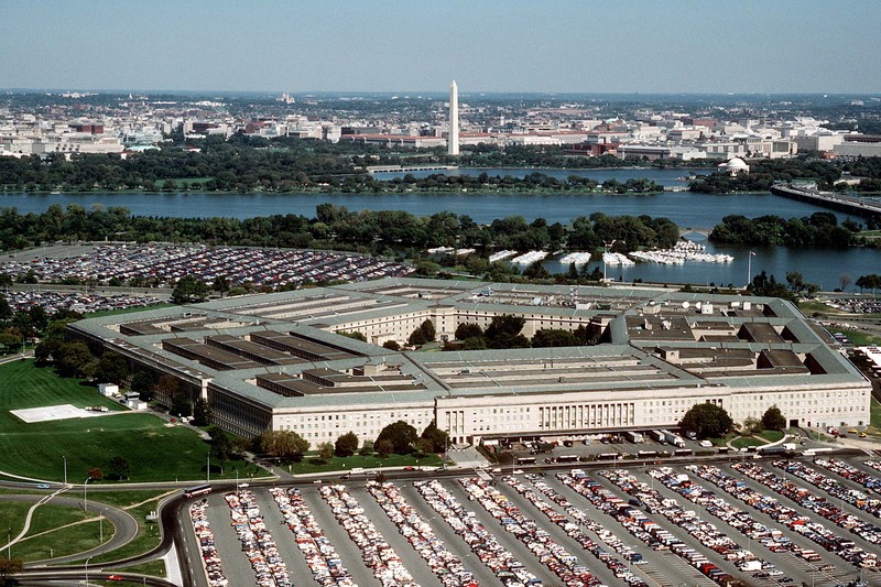 Aerial view of the Pentagon, the U.S. Department of Defense headquarters, with the Potomac River and Washington Monument in the background