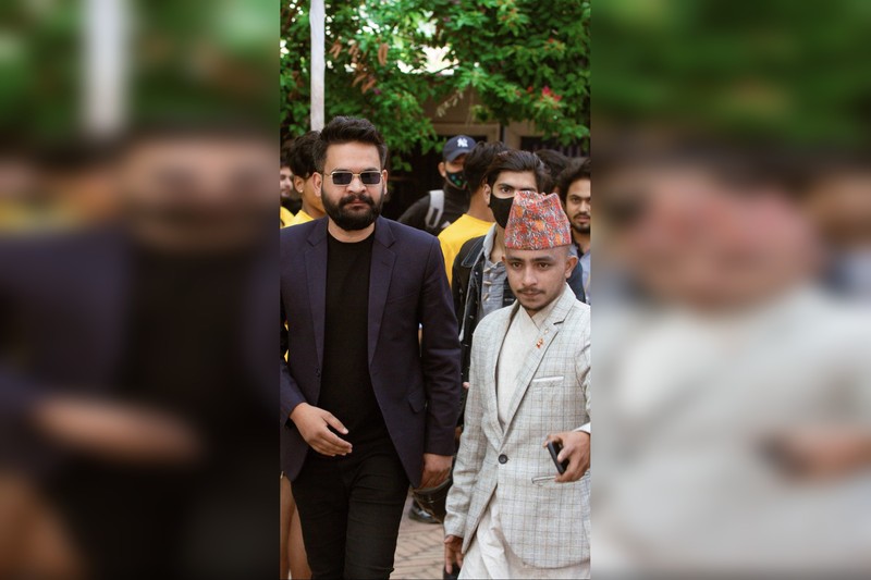 Balendra Shah wearing sunglasses at outdoor public event in Kathmandu