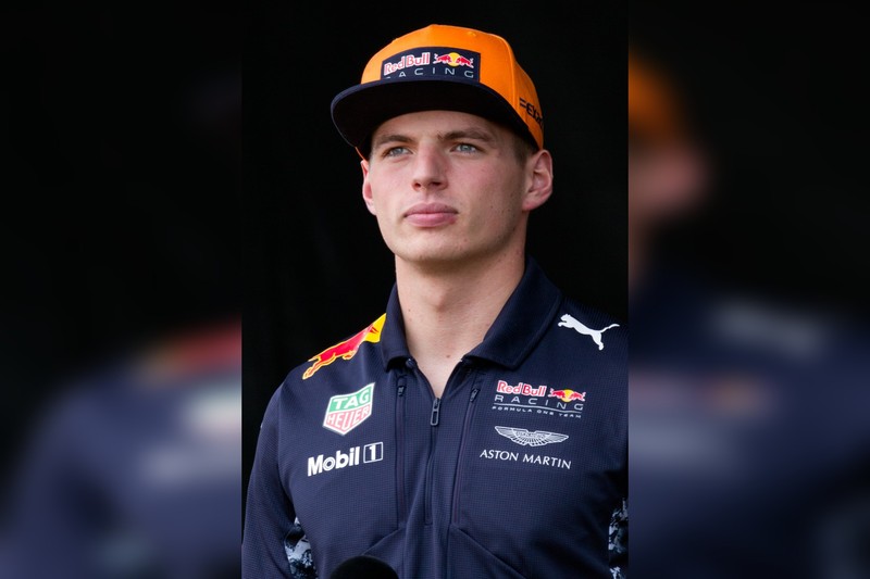 Max Verstappen wearing Red Bull Racing cap in portrait