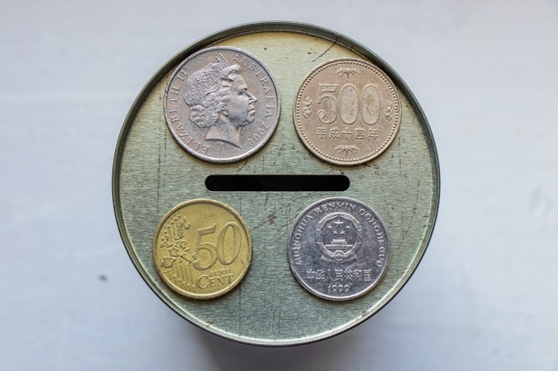 Coins from top to bottom, left to right: Australian 20 Cent, Japanese 500 Yen, Euro 50 Cent, Chinese 1 Yuan