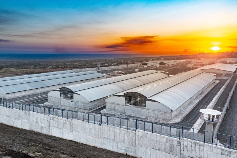 Aerial view of the Terrorism Confinement Center (CECOT) maximum security prison in Tecoluca, El Salvador, at sunset