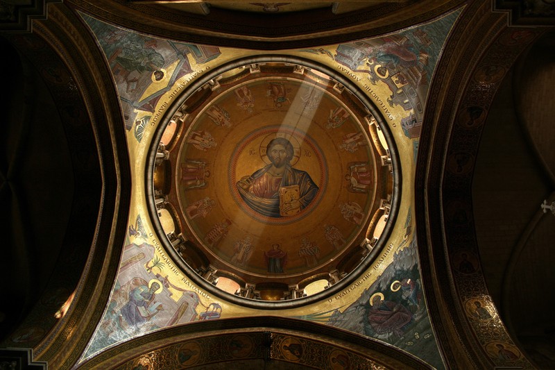 The ornate domed ceiling inside the Catholicon of the Church of the Holy Sepulchre in Jerusalem