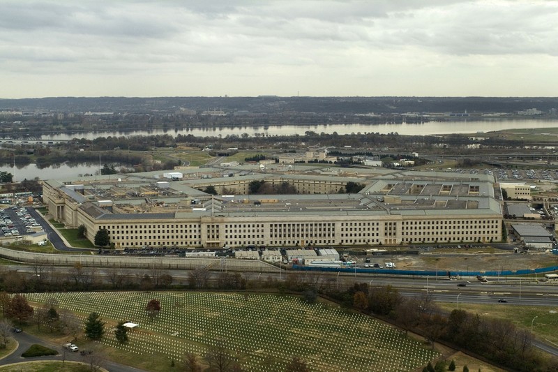 Aerial view of the Pentagon headquarters in Arlington, Virginia, with the Potomac River visible in the background.