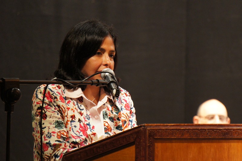 Delcy Rodríguez speaking at a podium during an official event in Caracas, Venezuela