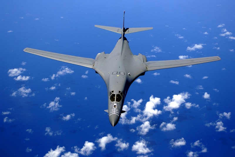 A U.S. Air Force B-1B Lancer bomber flies over the Pacific Ocean near Guam