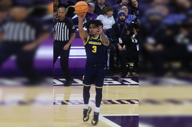 Michigan Wolverines basketball player Elliot Cadeau (#3) during a game against Northwestern at Welsh-Ryan Arena