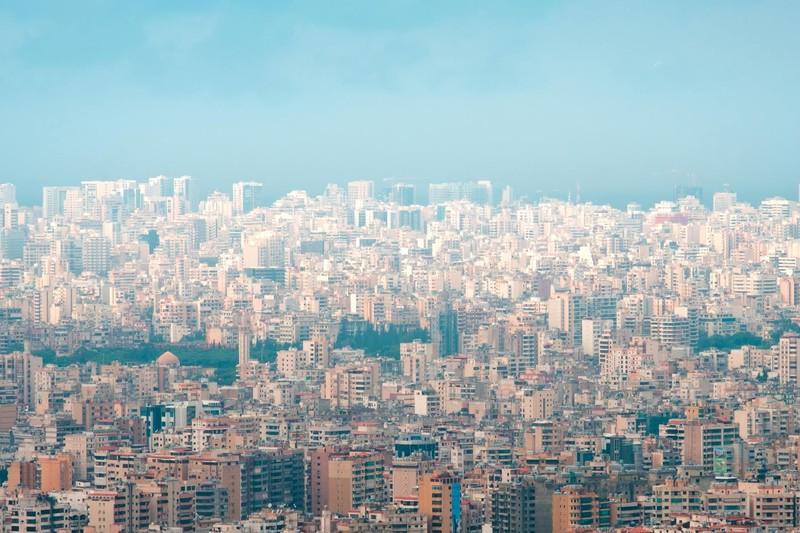 Aerial view of Beirut's dense urban skyline with modern skyscrapers and residential buildings