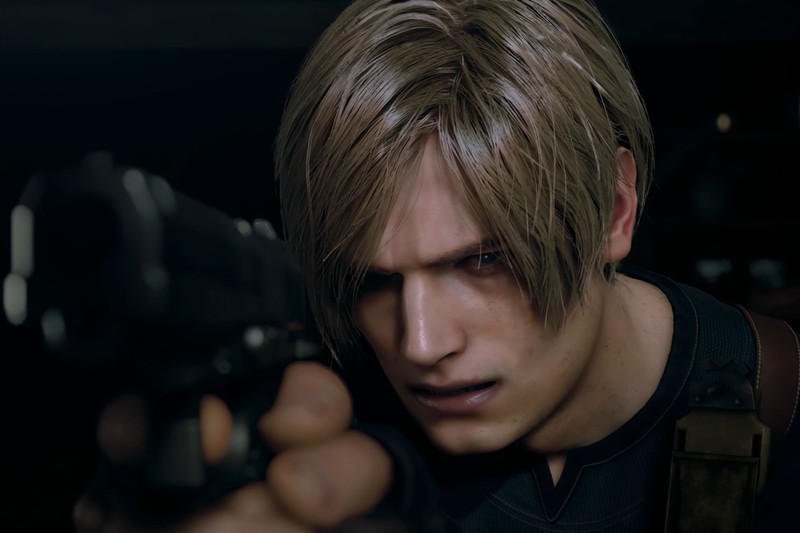 Leon S. Kennedy holds a handgun in a tense, dark scene from Resident Evil 4 Remake