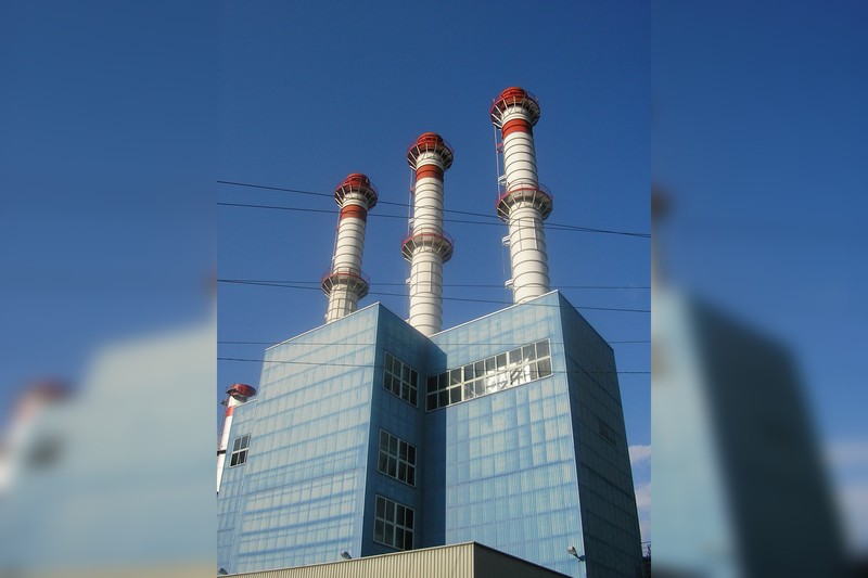 Industrial smokestacks at a power plant