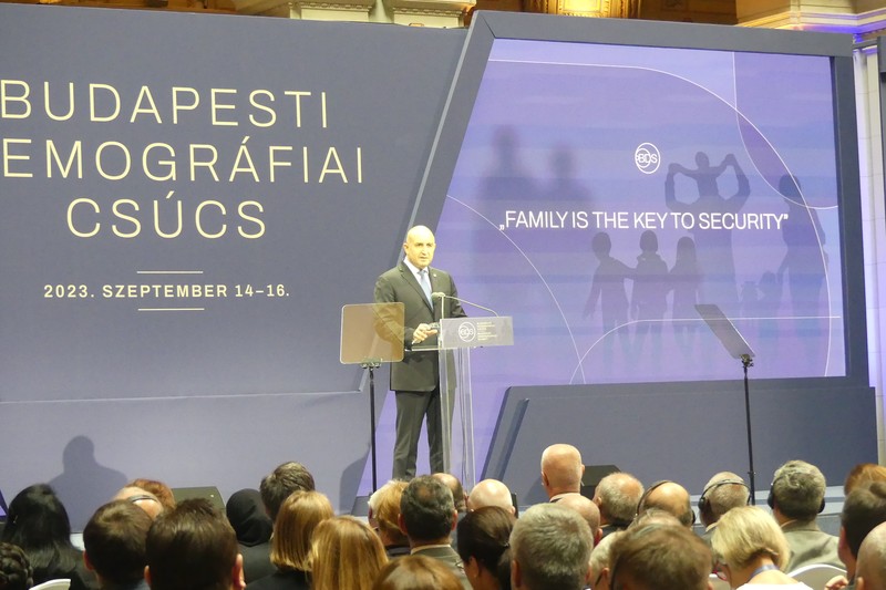Rumen Radev speaking at a podium at the Budapest Demographic Summit 2023