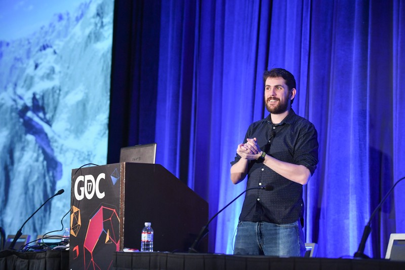 Sean Murray of Hello Games speaking at the Game Developers Conference podium