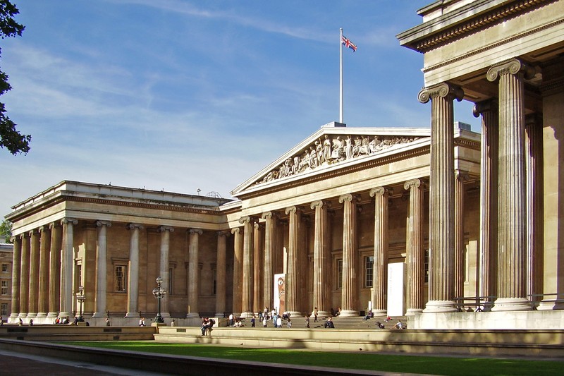 The neoclassical façade of the British Museum in London, with its iconic columns and pediment