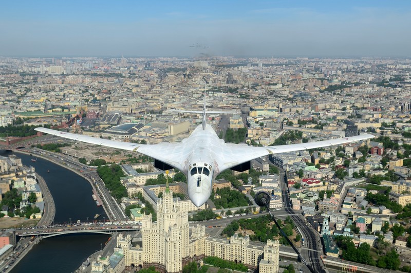 A Tupolev Tu-160 strategic bomber flies over Moscow during a Victory Day military parade