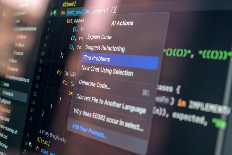 A code editor displaying an AI-assisted coding menu with options for explaining, refactoring, and generating code