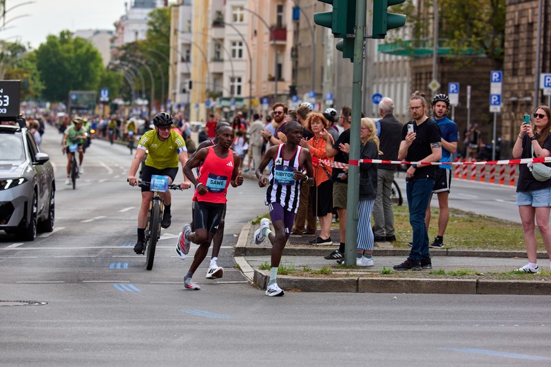 Sabastian Sawe competing at the Berlin Marathon, running on a city street in athletic gear