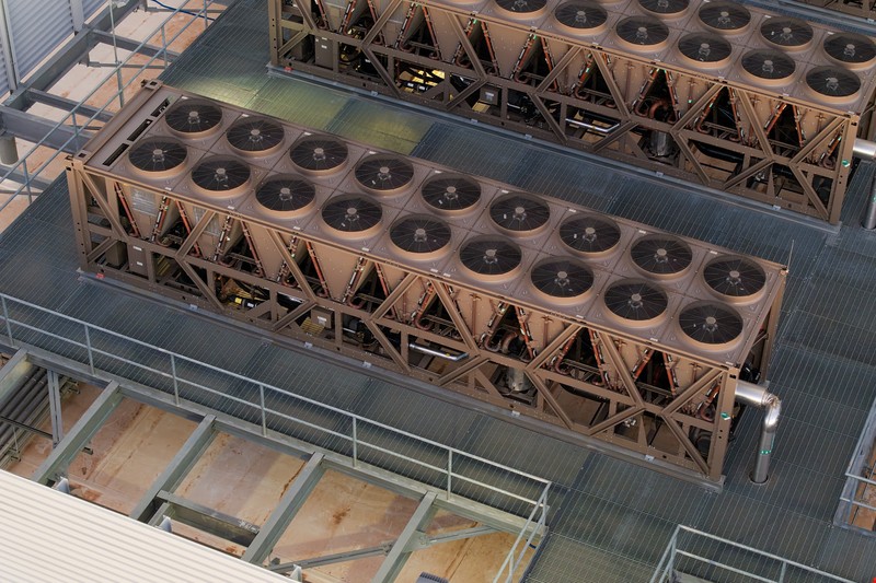 Cooling towers mounted on the roof of a data center building in Mesa, Arizona