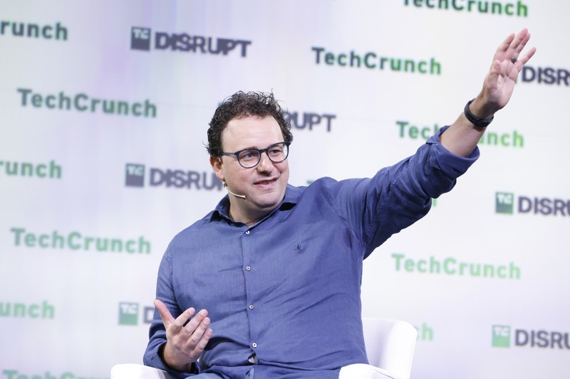 Dario Amodei, CEO of Anthropic, speaks on stage at TechCrunch Disrupt 2023