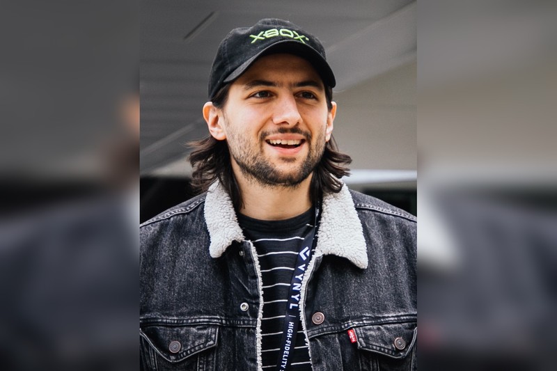 Eric Barone, creator of Stardew Valley, smiling and wearing an Xbox cap at Hackfort 2019