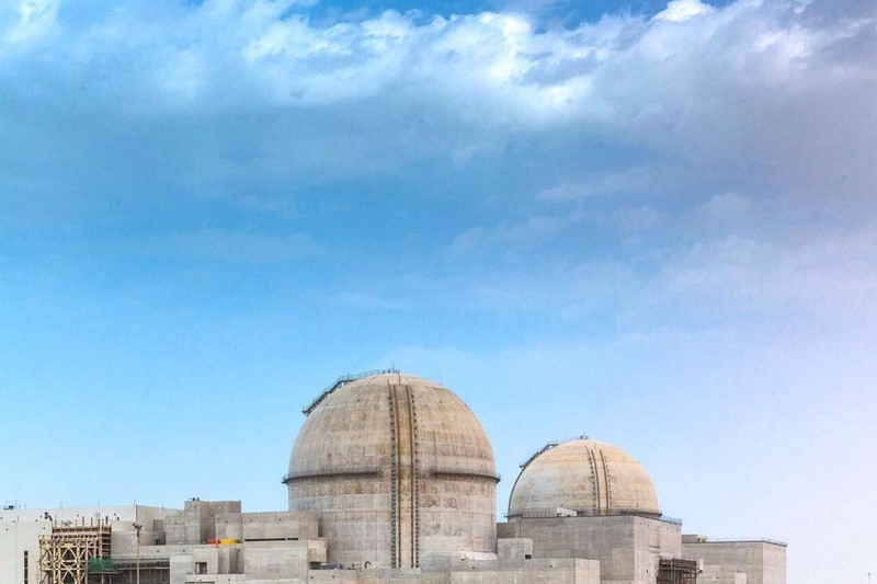 Barakah nuclear power plant containment domes under construction in the UAE desert