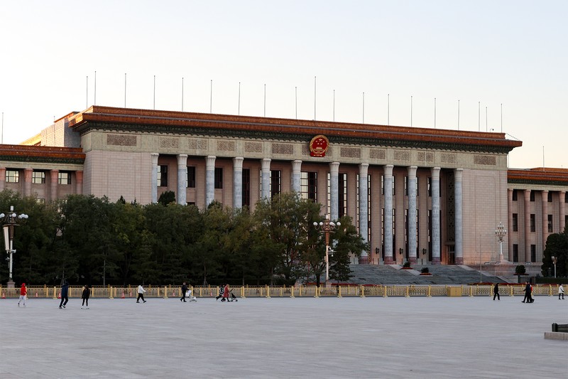 The Great Hall of the People in Beijing, China, with its neoclassical columns and Chinese national emblem
