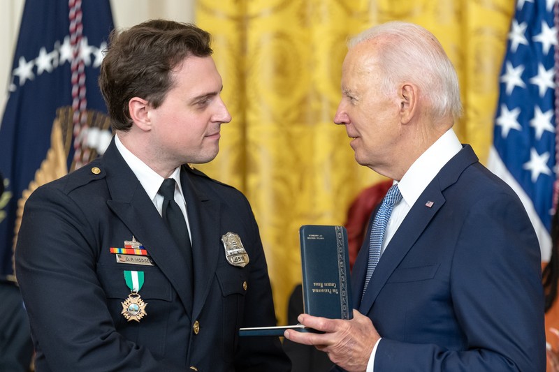 President Joe Biden presents the Presidential Citizens Medal to U.S. Capitol Police Private First Class Harry Dunn in the East Room of the White House