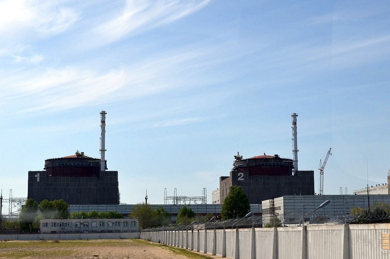 The Zaporizhzhia nuclear power plant showing two numbered reactor containment buildings under a clear sky