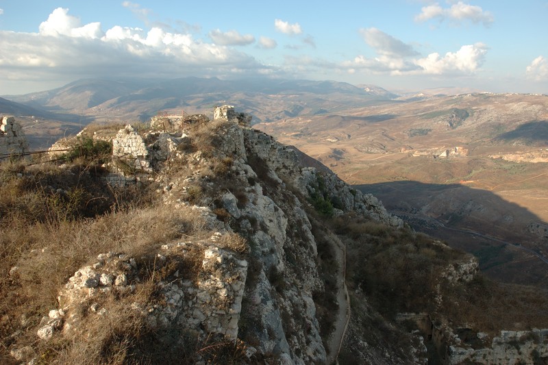 Beaufort Castle ruins perched on a rocky hilltop in southern Lebanon, overlooking a vast mountainous landscape